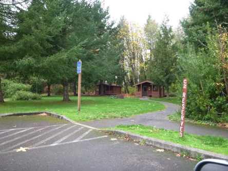Accessible parking at rental cabins in campground area – compacted gravel path – reserve at 800-452-5687